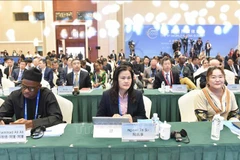 越通社副社长阮氏事出席在中国新疆维吾尔自治区举行的第六届世界媒体峰会。图自越通社