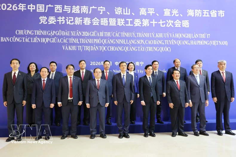 与会代表合影。图自越通社