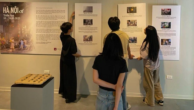 展览汇聚了九位来自国内外摄影师的作品。图自人民报