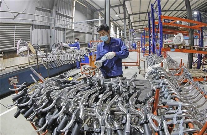 在统一股份公司生产自行车。图自越通社