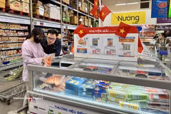 胡志明市的MM Mega Market超市在节假日期间通过打折促销活动吸引消费者。图自越通社