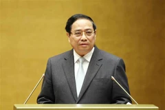 范明政总理在会上发言。图自越通社