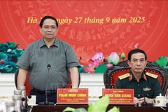 越南政府总理范明政在会议上发表讲话。图自越通社