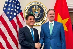 越南工贸部长阮鸿延与美国贸易代表贾米森·格里尔（Jamieson Greer）。图自越通社
