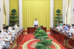 越南国家主席梁强发言。图自越通社