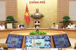 范明政总理主持召开政府与各地方全国视频会议。图自越通社