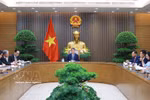 越南政府总理黎明兴与新西兰总理克里斯托弗·拉克森通电话。图自越通社