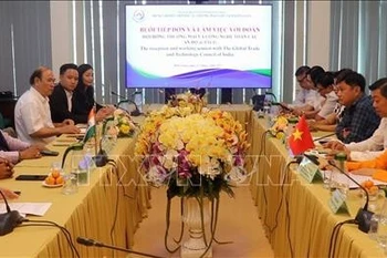 会议场景。图自越通社