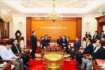 宁平省人民委员会主席范光玉在会上发言。图自越通社