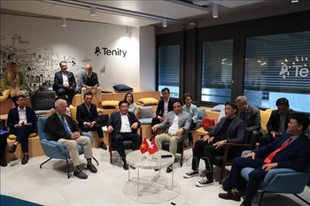 座谈会现场。图自越通社