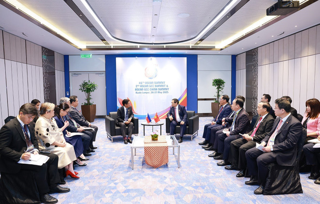 见面会场景。图自越通社 vna-potal-thu-tuong-pham-minh-chinh-gap-tong-thong-philippines-ferdinand-marcos-jr-8055193.jpg