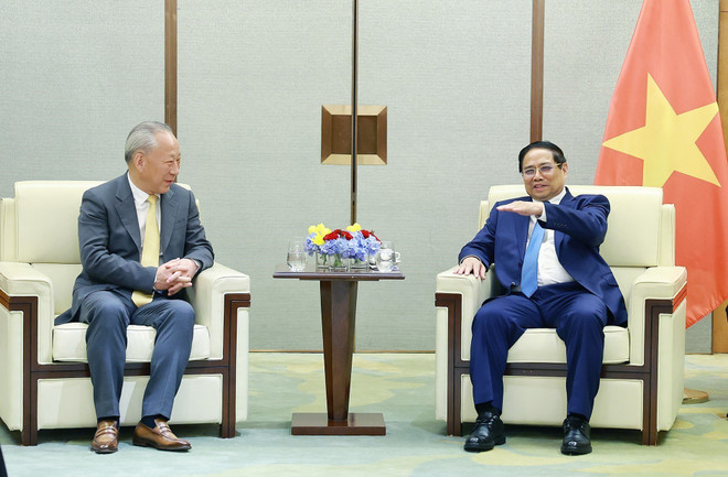 范明政会见了中国太平洋建设集团董事局主席严介和。图自越通社 vna-potal-thu-tuong-tiep-lanh-dao-mot-so-tap-doan-lon-trung-quoc-dang-hop-tac-va-dau-tu-tai-viet-nam-8115680.jpg