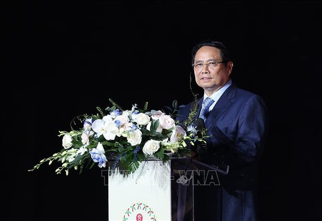 越南政府总理范明政在开幕式上发表讲话。图自越通社 pmc.jpg