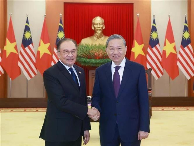 vna-potal-tong-bi-thu-to-lam-tiep-thu-tuong-malaysia-anwar-ibrahim-7874226.jpg
