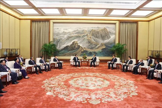 见面会现场。图自越通社 luong-cuong-2.jpg