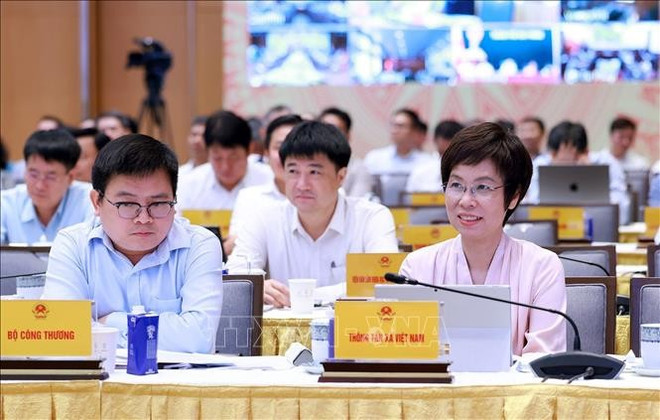 出席会议的代表们。图自越通社 uuid4a317b3a-c411-4079-a846-a4818a0a5021code001library1type1mode1loctruecaptrue.jpg