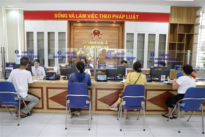 河内市金莲坊公共行政服务中心 图自越通社 vna-potal-chinh-quyen-dia-phuong-2-cap-quan-ly-hieu-qua-nguoi-dan-hai-long-8137245.jpg