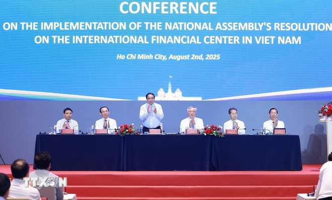 会议现场。图自越通社 0208-thu-tuong-trung-tam-tai-chinh-quoc-te-1.jpg