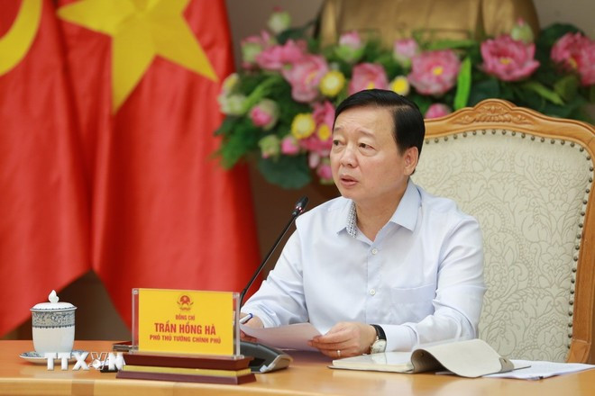 陈红河副总理发表讲话。图自越通社 0506-tran-hong-ha.jpg