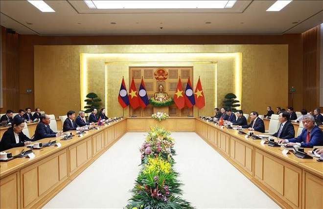会见现场。图自越通社 lao-2.jpg
