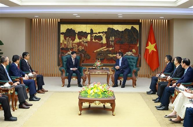 会见现场。图自越通社 vna-potal-thu-tuong-tiep-thong-doc-tinh-gunma-nhat-ban-8351770.jpg