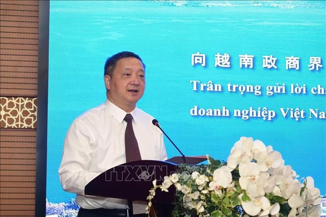 大理州委书记杨国宗。图自越通社 vna-potal-thuc-day-hop-tac-kinh-te-thuong-mai-giua-lao-cai-va-chau-dai-ly-trung-quoc-stand.jpg