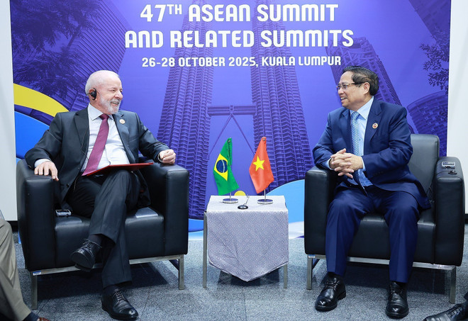 范明政总理和巴西总统卢拉·达席尔瓦。图自越通社 vna-potal-asean-47-thu-tuong-pham-minh-chinh-gap-tong-thong-brazil-lula-da-silva-8364091.jpg