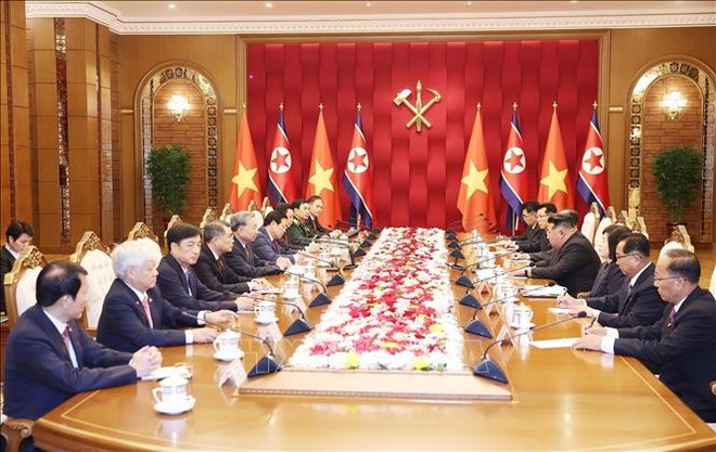 会谈现场。图自越通社 hoi-dam.jpg