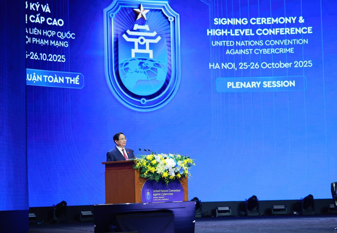 范明政发表讲话。图自越通社 vna-potal-cong-uoc-ha-noi-phien-thao-luan-toan-the-cap-cao-thu-nhat-8362525.jpg