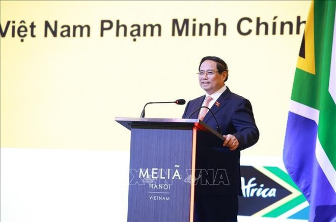 范明政总理在论坛上发表讲话。图自越通社 thu-tuong-pmc.jpg