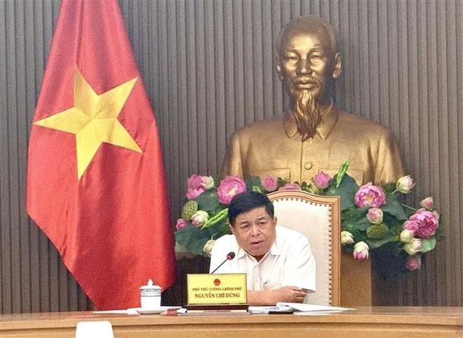 越南副总理阮志勇主持召开会议。图自越通社 vna-potal-pho-thu-tuong-nguyen-chi-dung-hop-ve-dau-tu-mo-rong-cang-hang-khong-quoc-te-phu-quoc-8046193.jpg