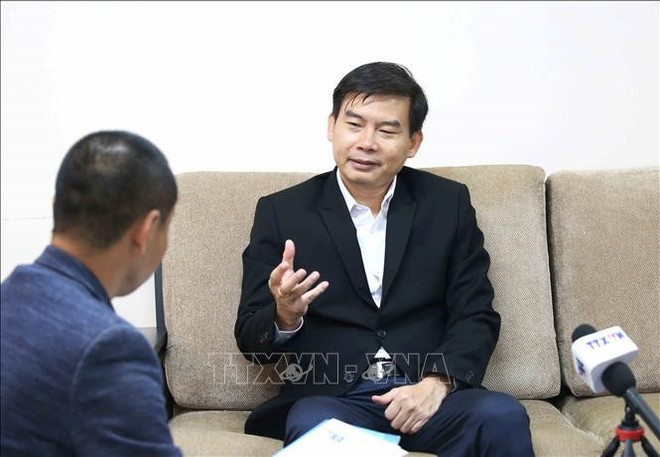 柬埔寨国会副秘书长、国会顾问小组组长、区域政治问题分析专家强万纳里。图自越通社 柬埔寨国会副秘书长、国会顾问小组组长、区域政治问题分析专家强万纳里。图自越通社