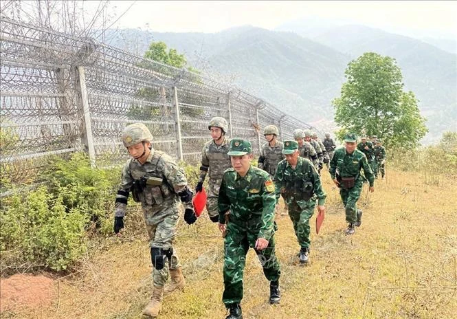 越南和中国边防部队进行双边巡逻。图自越通社