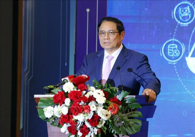 越南政府总理范明政在会议上发言。图自越通社