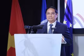 越南政府总理范明政出席越法企业论坛。图自越通社