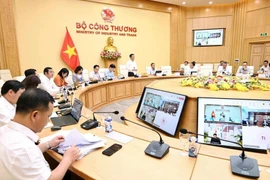 会议场景。图自越通社