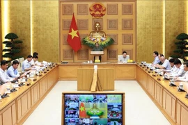 会议现场。图自越通社