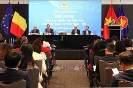 会议场景。图自越通社
