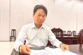 同塔省边境常福乡炯炯庞村委书记陈文平。图自越通社
