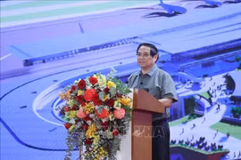 范明政总理在仪式上致辞。图自越通社