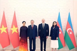 阿塞拜疆总统阿利耶夫和夫人和越共中央总书记苏林与夫人合影。图自越通社