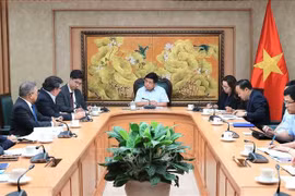 会见现场。图自越通社