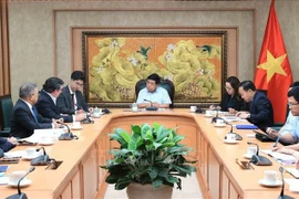 会见现场。图自越通社