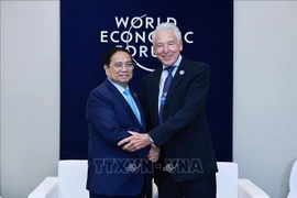 越南政府总理范明政会见世界经济论坛领导人