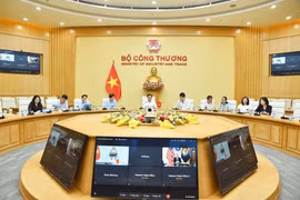 双方进行线上通话。图自越通社