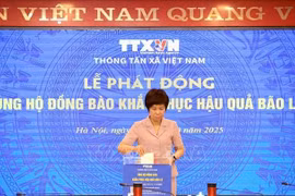 越通社社长武越庄进行捐款。图自越通社