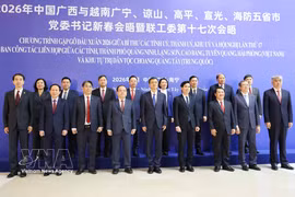 与会代表合影。图自越通社