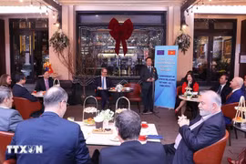 会见现场。图自越通社