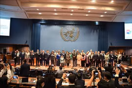 与会代表合影。图自越通社
