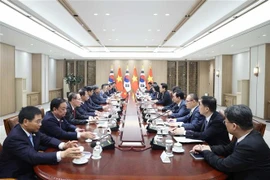 会谈现场。图自越通社